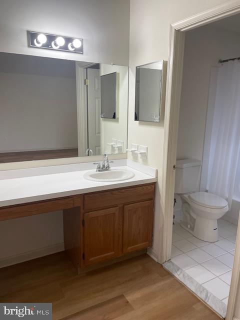 9200 Old Newtown Road Philadelphia, PA 19115 - Photo 26 of 36 a spacious bathroom with a toilet sink and mirror