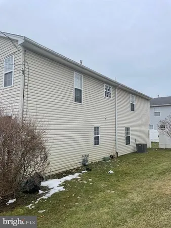 a house view with a backyard space