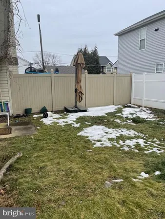 a view of a backyard of a house