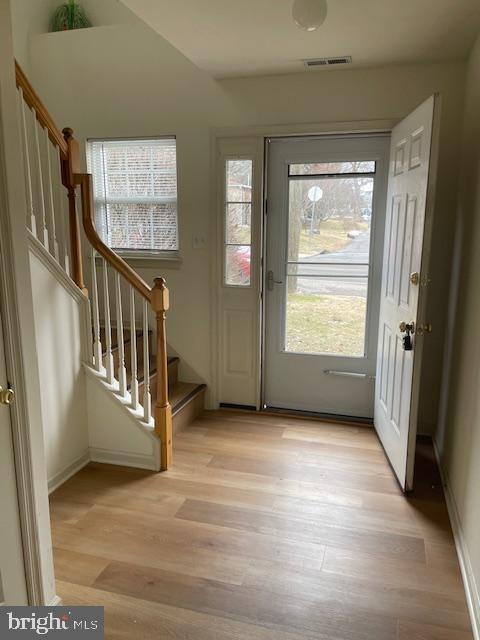9200 Old Newtown Road Philadelphia, PA 19115 - Photo 4 of 36 a view of a hallway with windows and stairs