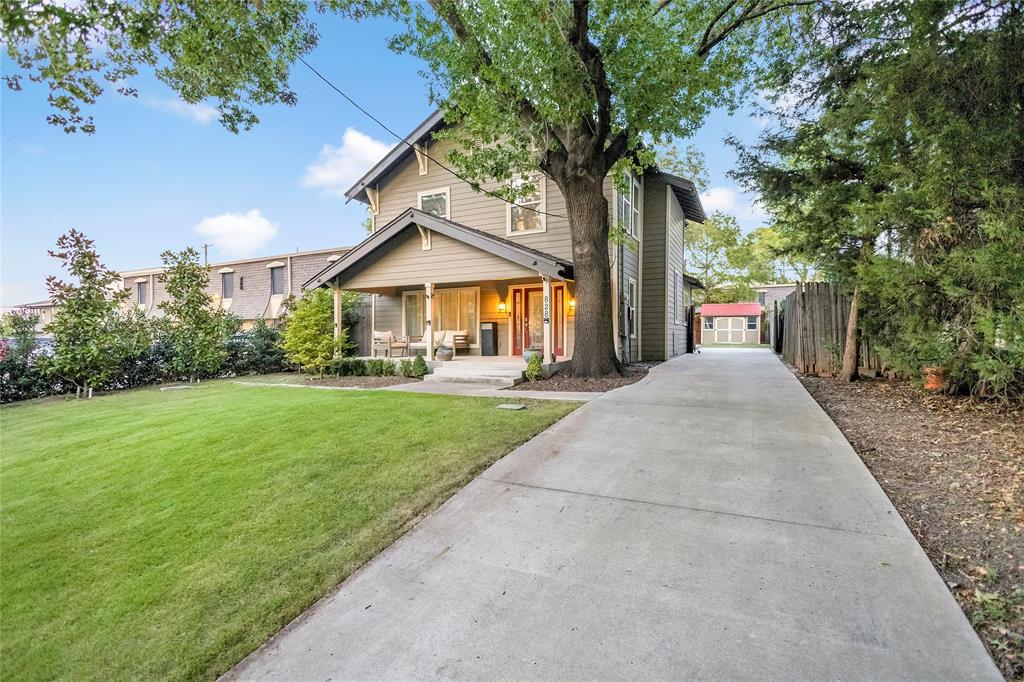 828 Elsbeth Street Dallas, TX 75208 - Photo 2 of 35 a view of a house with a yard