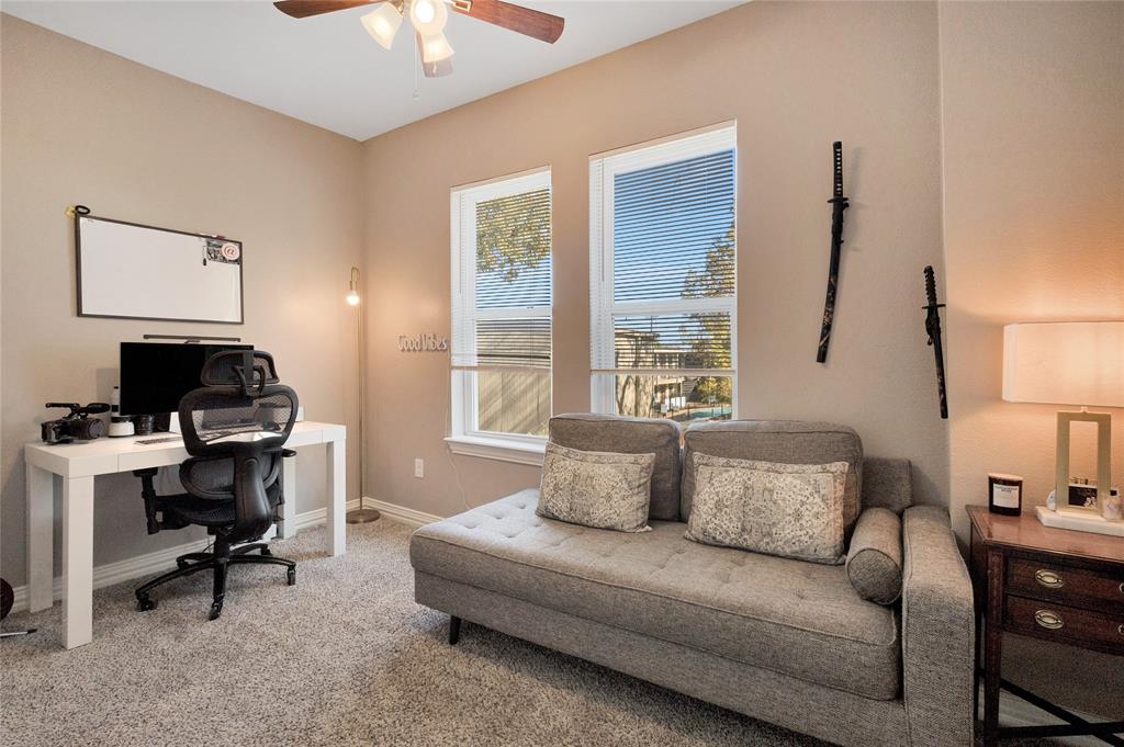 828 Elsbeth Street Dallas, TX 75208 - Photo 24 of 35 a living room with furniture and a window