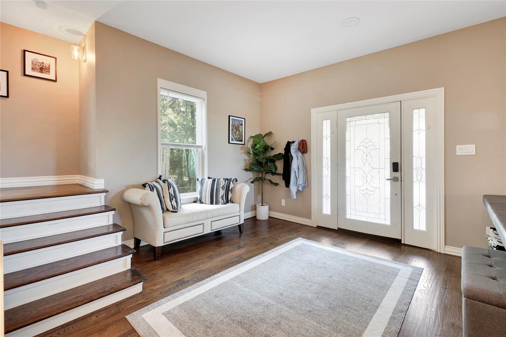 828 Elsbeth Street Dallas, TX 75208 - Photo 3 of 35 a living room with furniture and wooden floor