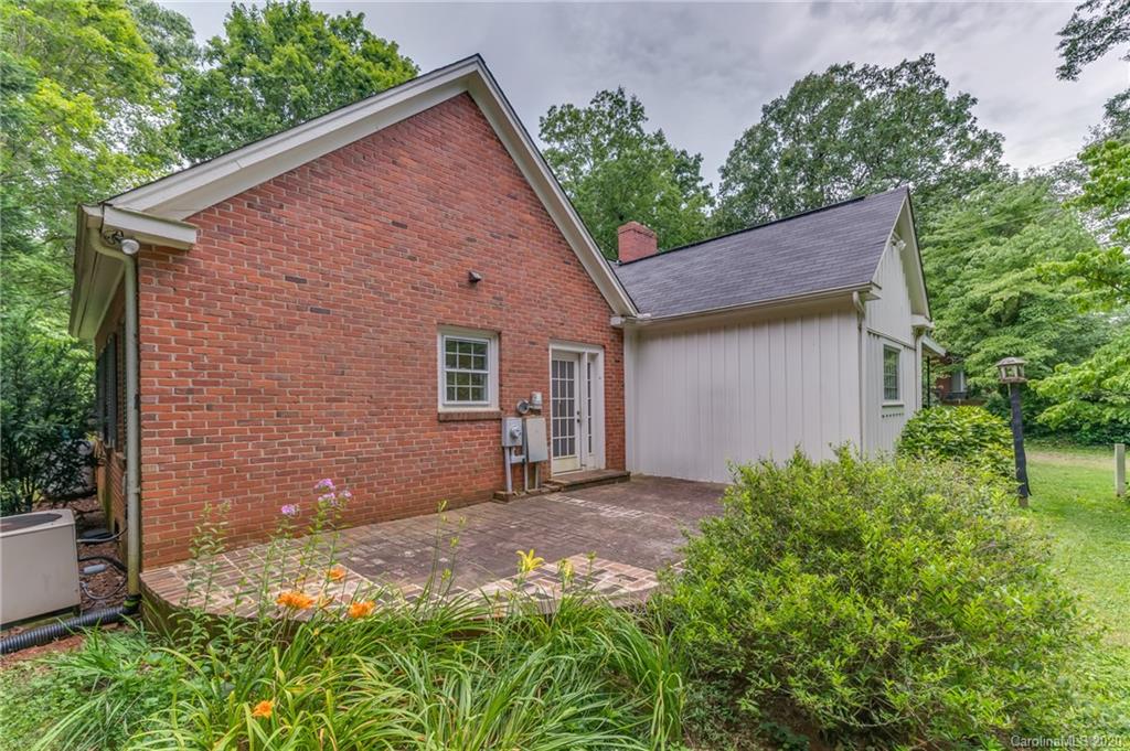 402 Chimney Rock Road Rutherfordton, NC 28139 - Photo 2 of 36 a view of backyard of house with green space