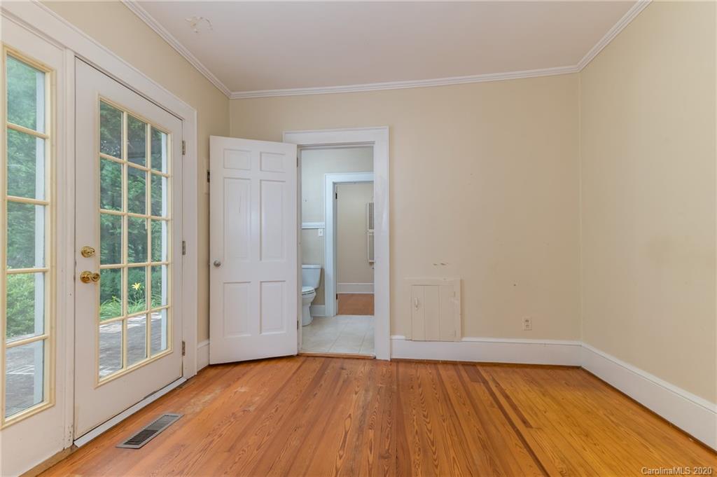 402 Chimney Rock Road Rutherfordton, NC 28139 - Photo 12 of 36 a view of a livingroom with wooden floor and entryway