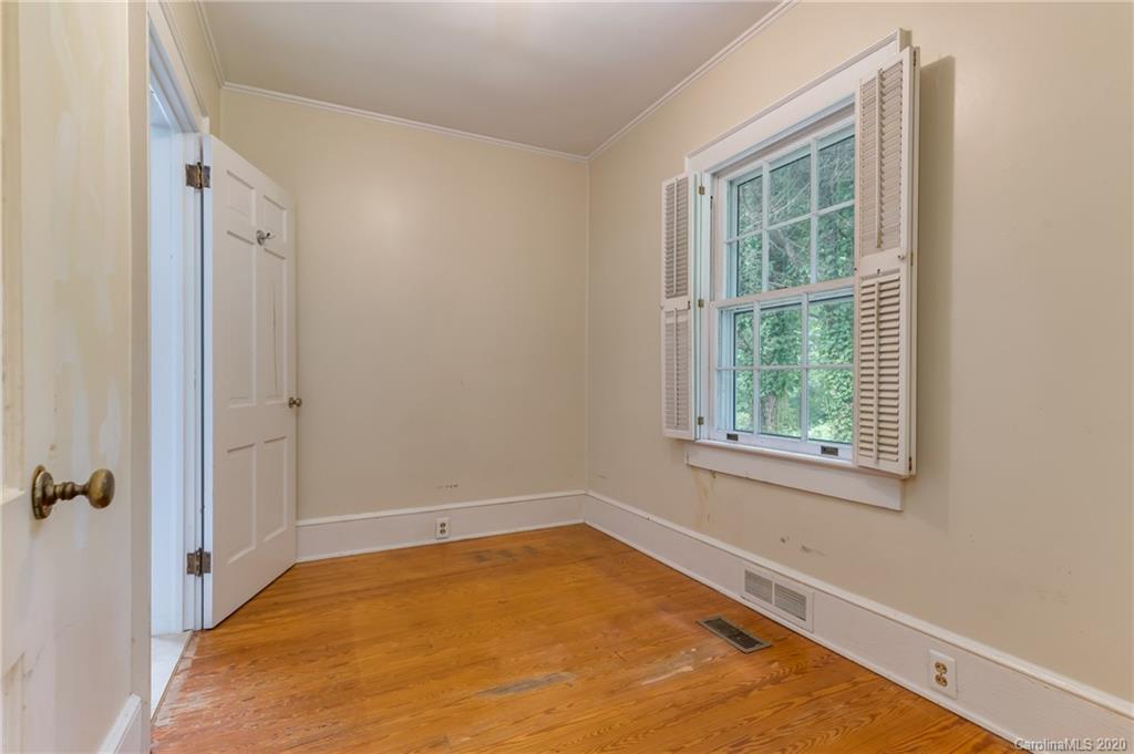 402 Chimney Rock Road Rutherfordton, NC 28139 - Photo 18 of 36 an empty room with a window