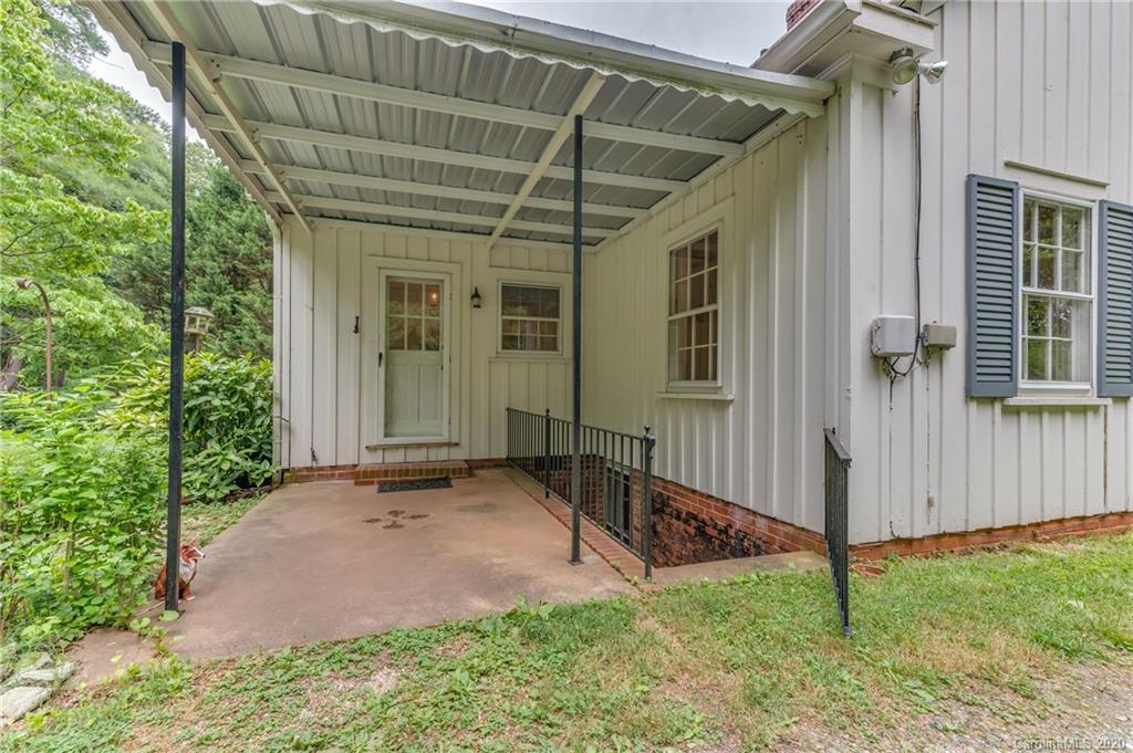 402 Chimney Rock Road Rutherfordton, NC 28139 - Photo 31 of 36 a view of a house with backyard and garden