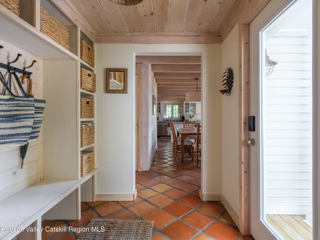 a view of entryway with livingroom and furniture