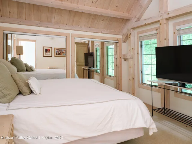 a bath tub sitting next to a shower