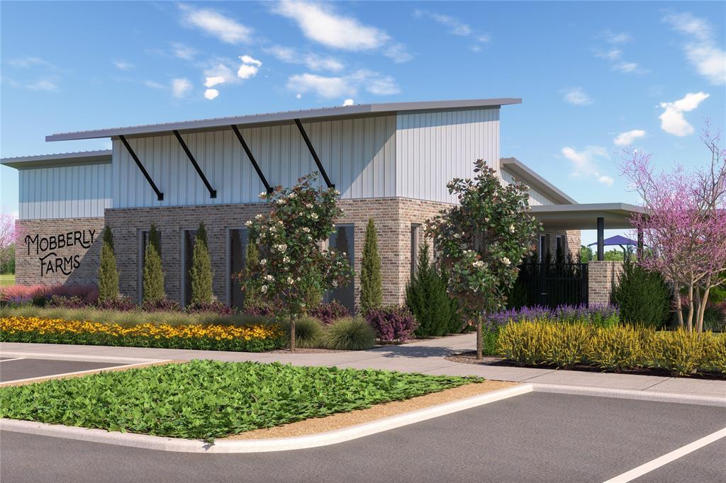 14225 Bacton Road Pilot Point, TX 76258 - Photo 4 of 11 a front view of a house with garden