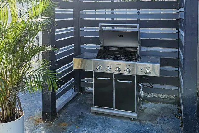 a view of a backyard with a patio