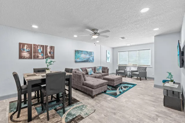 a view of a dining room with furniture