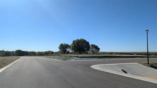 a view of a swimming pool and an outdoor space
