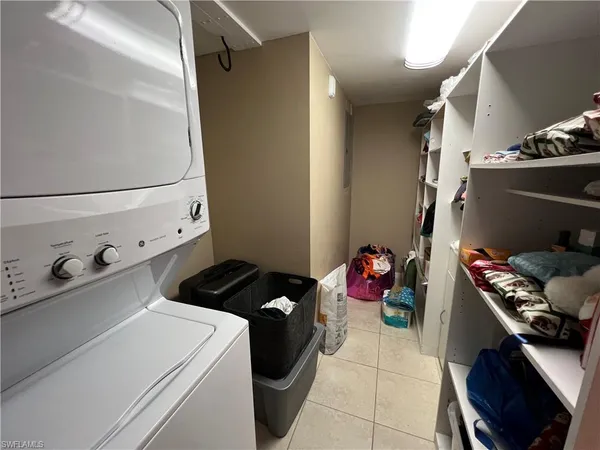 a kitchen with a stove and cabinets