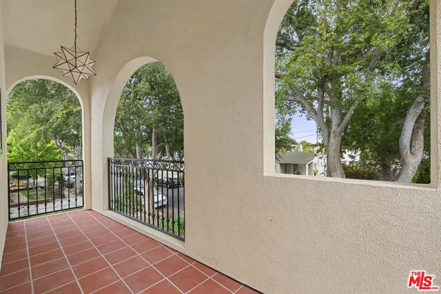 a view of a room with windows