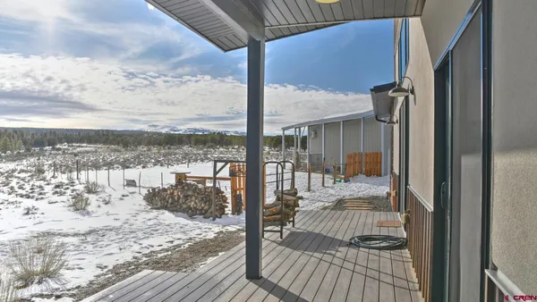 a front view of a house with a backyard