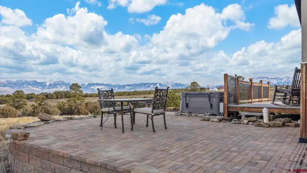a outdoor space with lots of furniture and garden