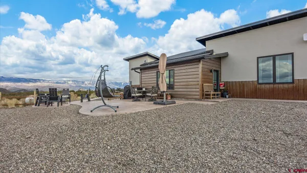 a view of a livingroom with furniture