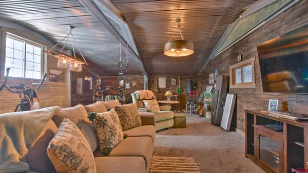 a view of a backyard with a water fountain and mountain view
