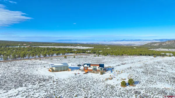 a view of a lake with a mountain in the background