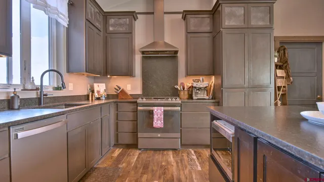 a view of a house with a snow in the yard