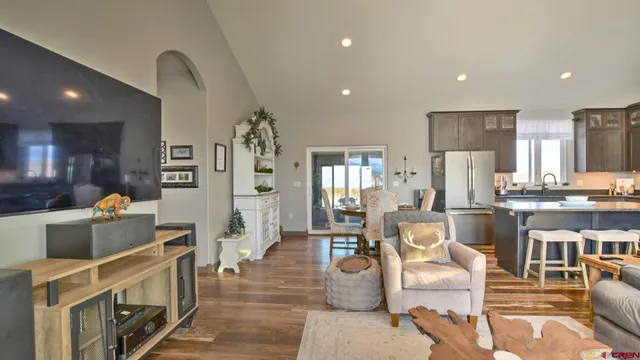 a work room with furniture and a potted plant
