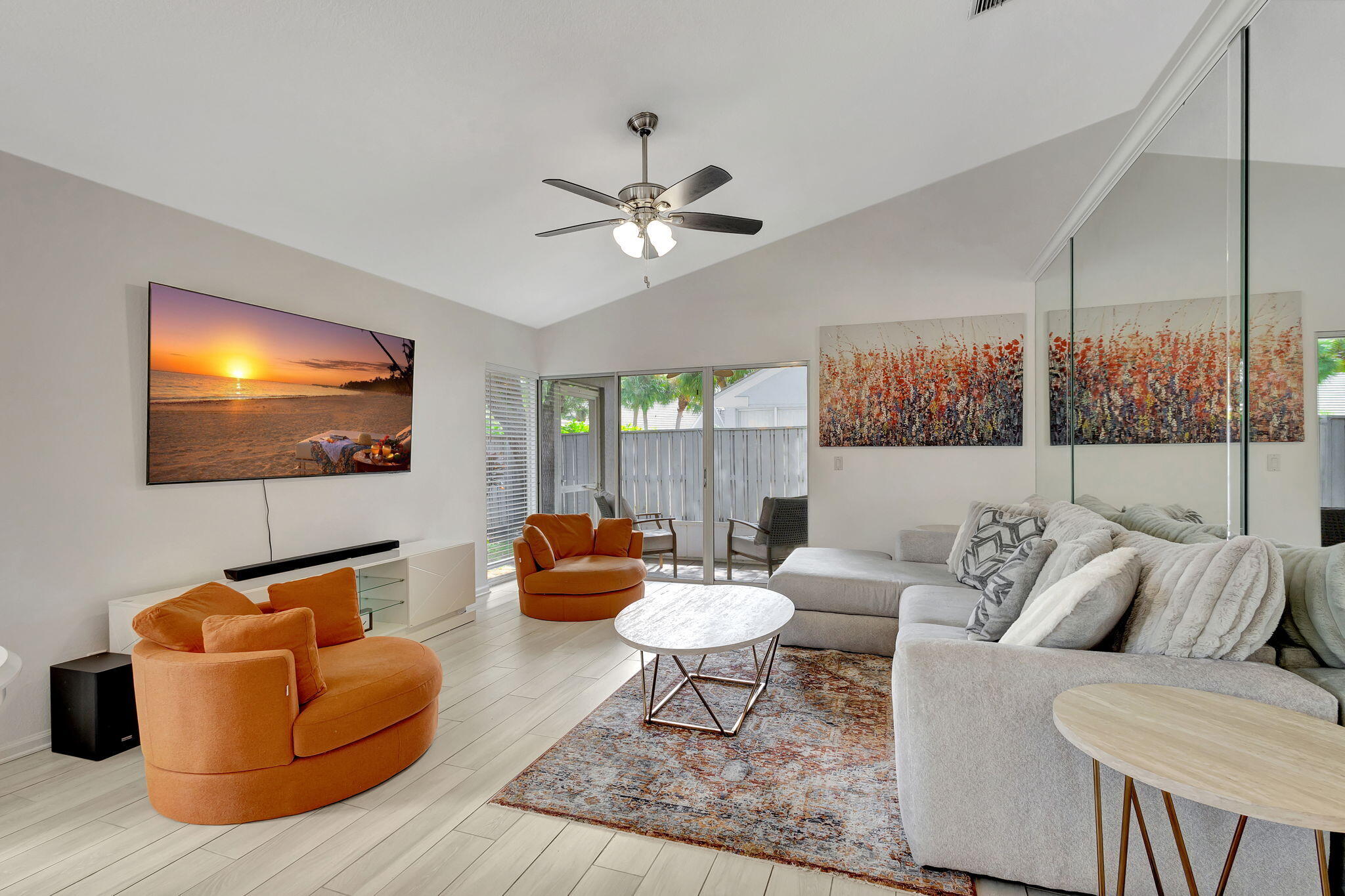 15 Admirals Court Palm Beach Gardens, FL 33418 - Photo 15 of 29 a living room with furniture and a flat screen tv