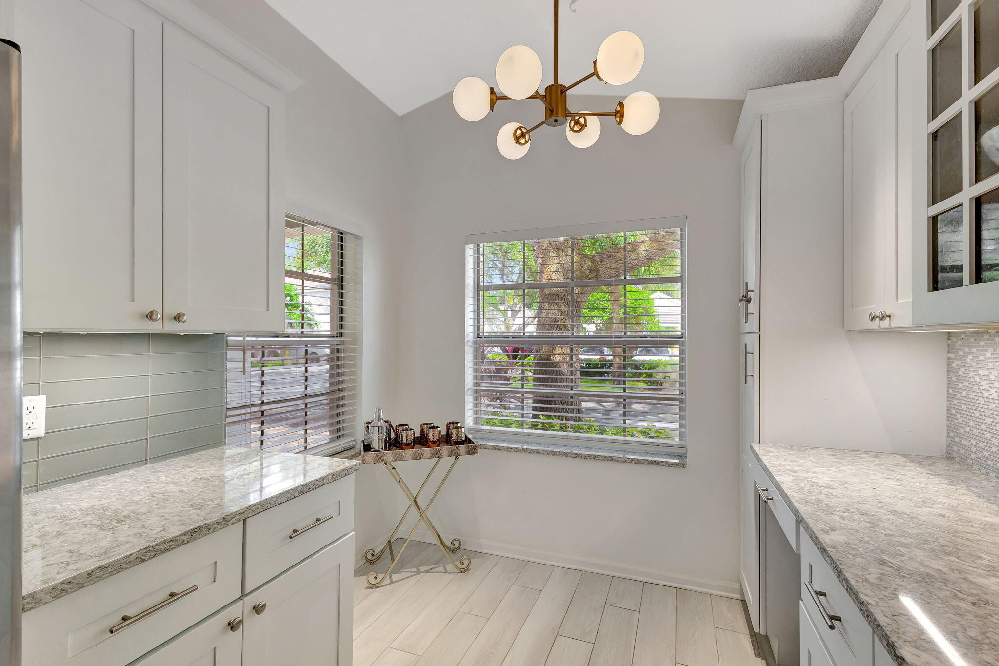 15 Admirals Court Palm Beach Gardens, FL 33418 - Photo 10 of 29 a kitchen with a sink cabinets and window