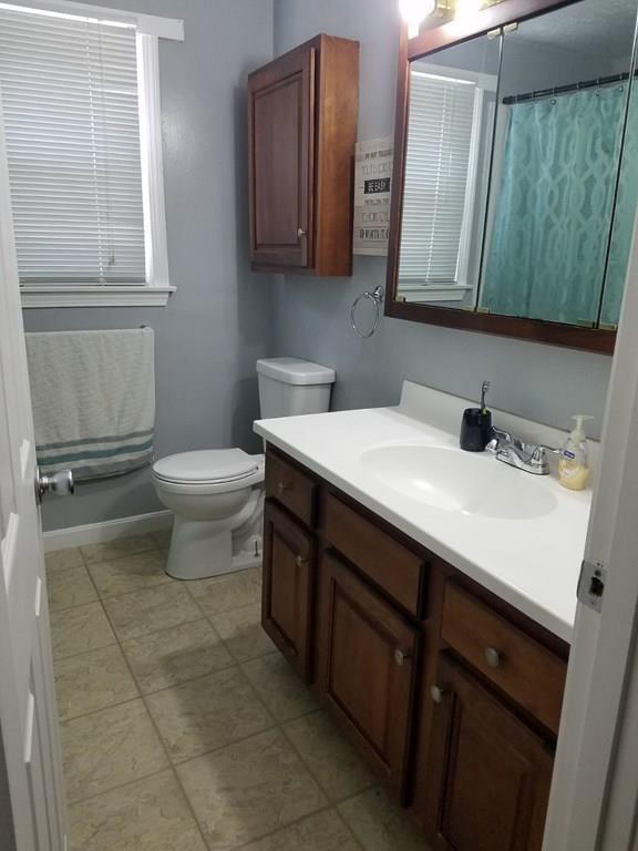 5 Jolicoeur Road Spencer, MA 01562 - Photo 21 of 33 a bathroom with a sink a toilet and mirror