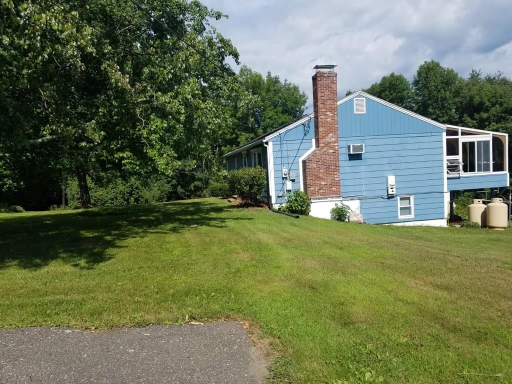 5 Jolicoeur Road Spencer, MA 01562 - Photo 3 of 33 a view of a house with backyard and garden