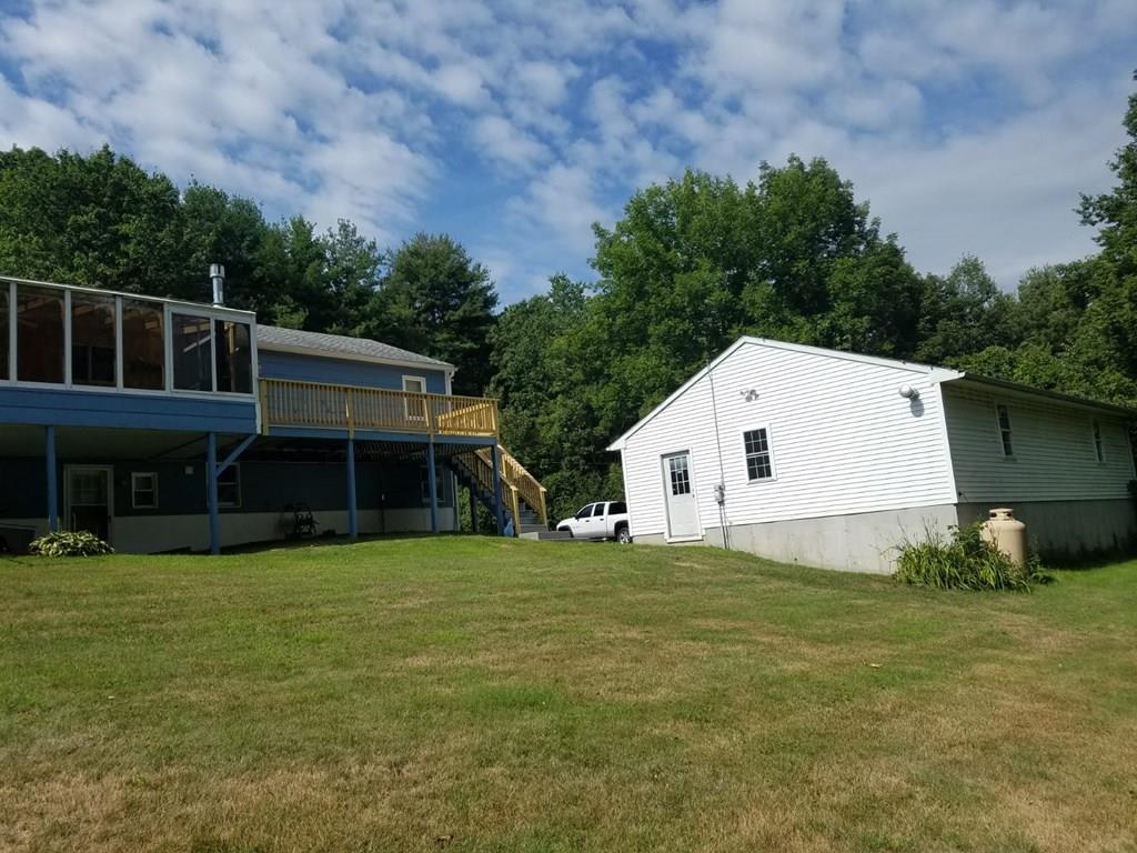5 Jolicoeur Road Spencer, MA 01562 - Photo 4 of 33 a view of a house with a yard
