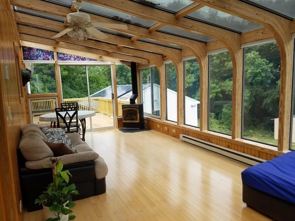 5 Jolicoeur Road Spencer, MA 01562 - Photo 10 of 33 a living room with furniture and a large window