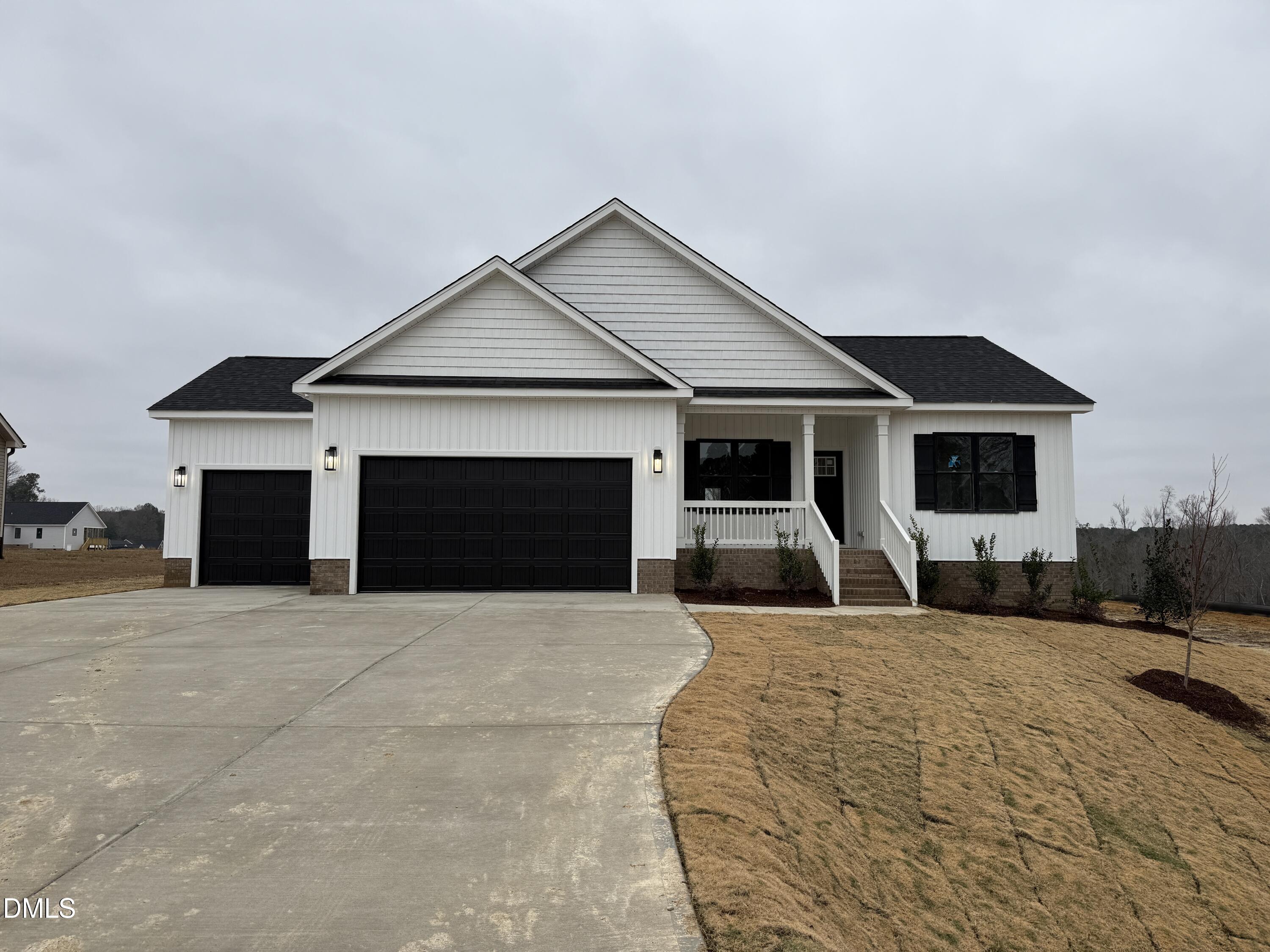 181 Royal Avenue Selma, NC 27576 - Photo 1 of 10 a front view of house with yard and seating space