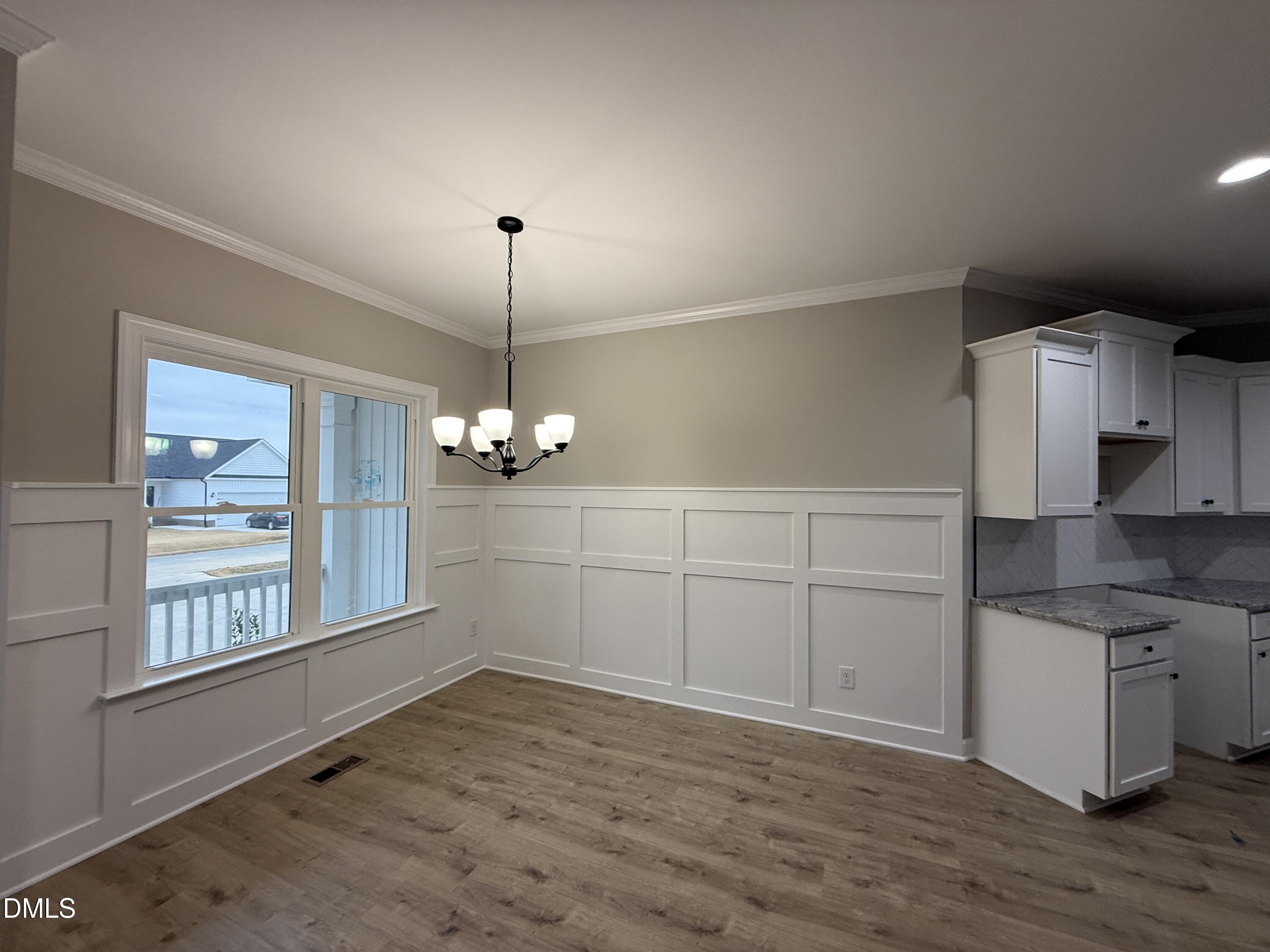 181 Royal Avenue Selma, NC 27576 - Photo 2 of 10 a view of a kitchen with a sink cabinets and window