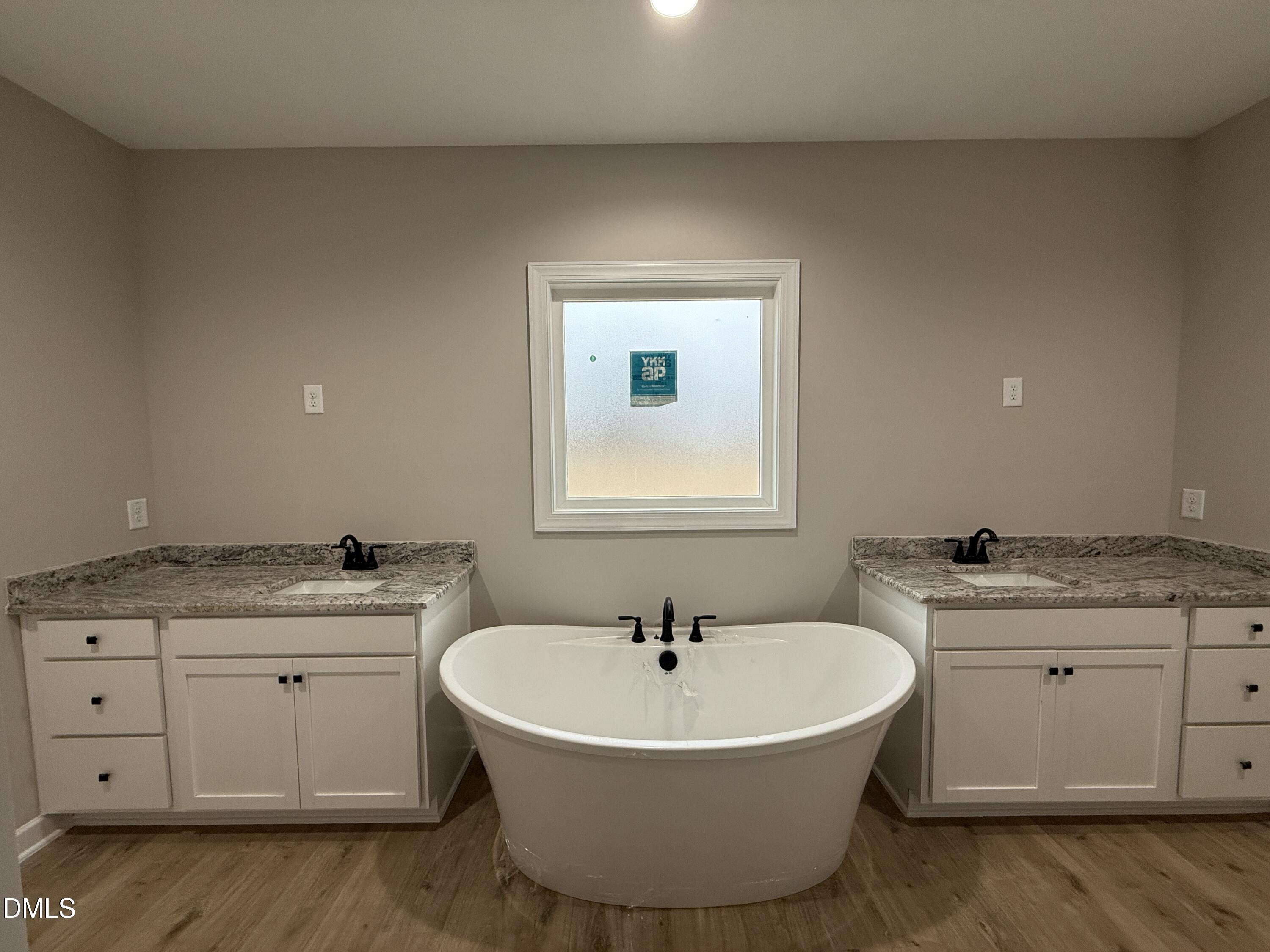 181 Royal Avenue Selma, NC 27576 - Photo 7 of 10 a bathroom with a sink and a mirror