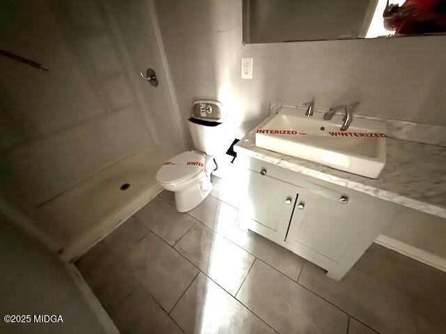 1664 Randall Road Macon, GA 31206 - Photo 5 of 9 a bathroom with a sink a toilet and a mirror