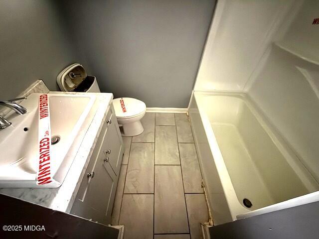 1664 Randall Road Macon, GA 31206 - Photo 6 of 9 a bathroom with a sink and toilet