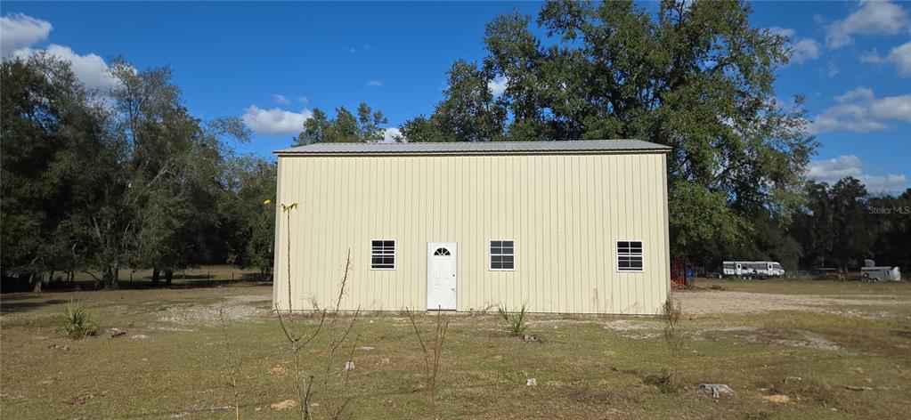 0 Jacobs Way Brooksville, FL 34601 - Photo 7 of 23 a view of a house with a trees