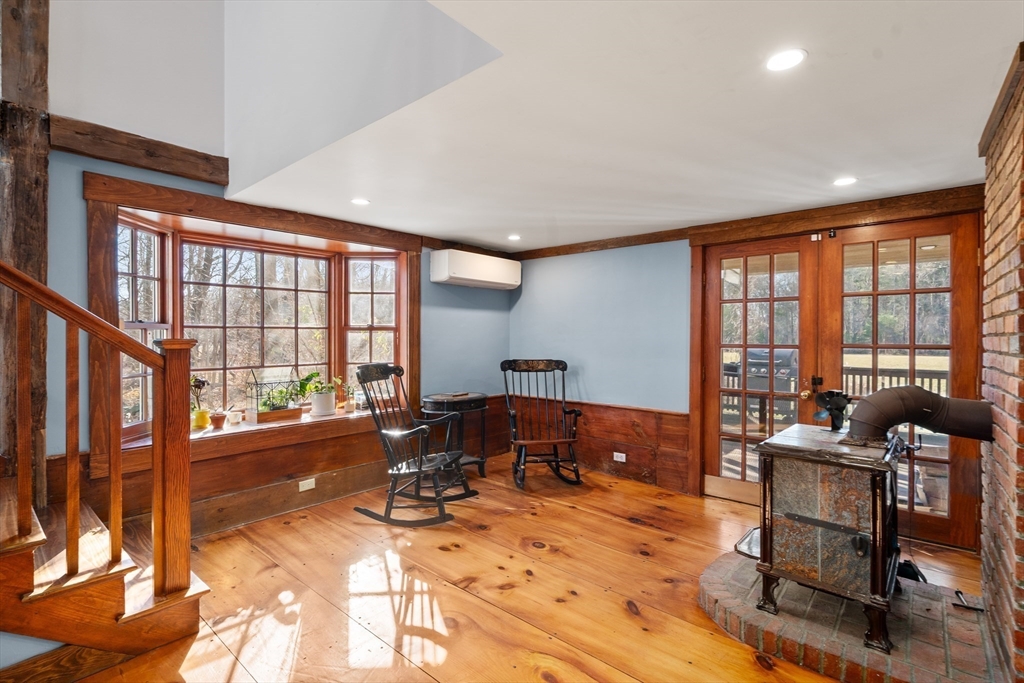 220 South Main Street Sherborn, MA 01770 - Photo 11 of 40 a living room with furniture large window and wooden floor