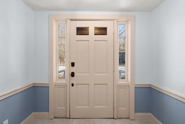 a view of a hallway with closet area