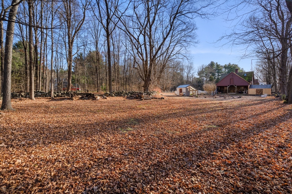 220 South Main Street Sherborn, MA 01770 - Photo 35 of 40 a backyard of a house with large trees