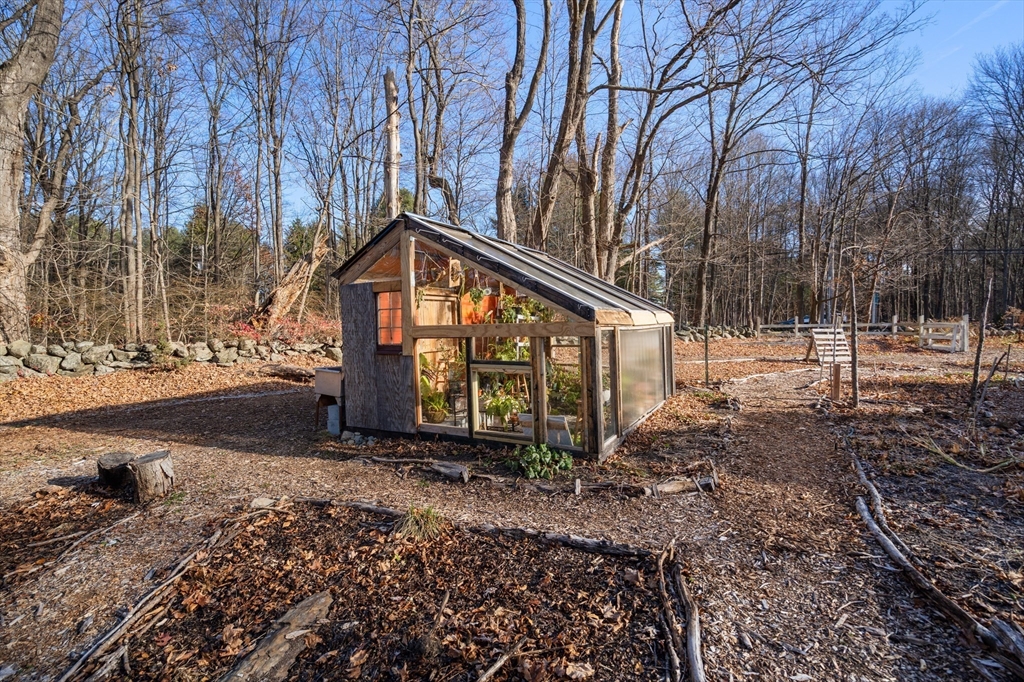 220 South Main Street Sherborn, MA 01770 - Photo 36 of 40 a view of a large trees with wooden fence