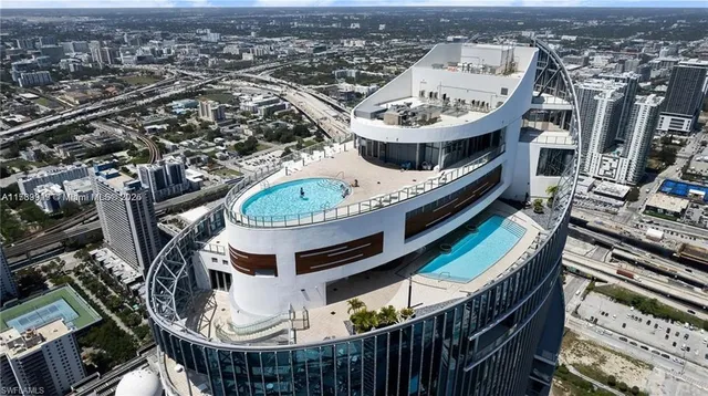 an aerial view of a highlighted house