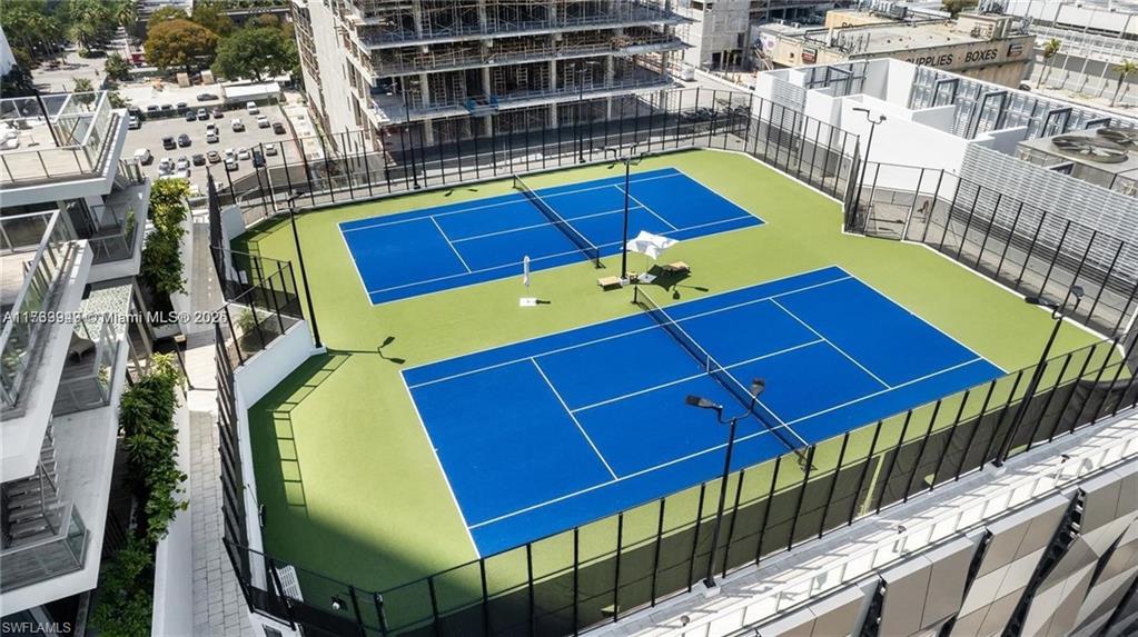 851 Northeast 1st Avenue, Unit 3303 Miami, FL 33132 - Photo 5 of 46 a view of a chairs and table in the balcony
