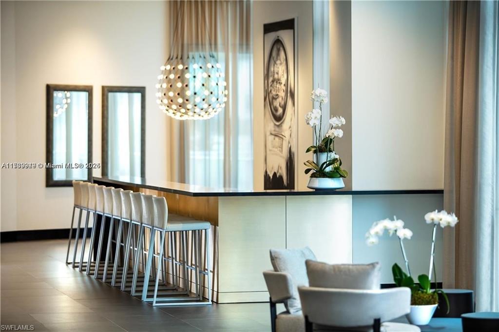 851 Northeast 1st Avenue, Unit 3303 Miami, FL 33132 - Photo 9 of 46 a view of entryway with wooden floor