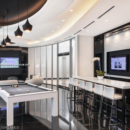 851 Northeast 1st Avenue, Unit 3303 Miami, FL 33132 - Photo 10 of 46 a room with furniture pool table and flat screen tv