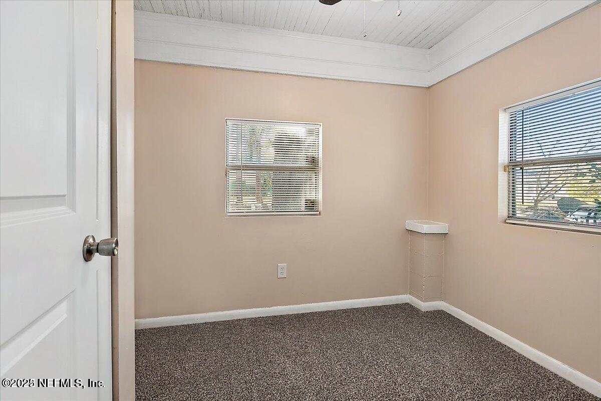 5349 Rio Grande Avenue Jacksonville, FL 32254 - Photo 2 of 6 an empty room with windows