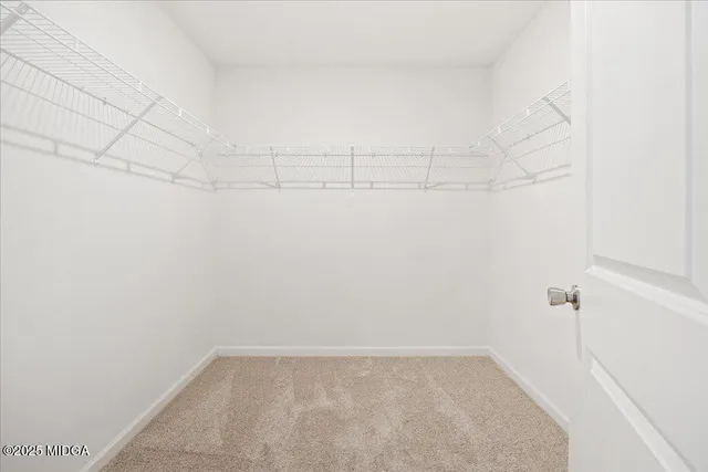 a view of a room with racks on the wall