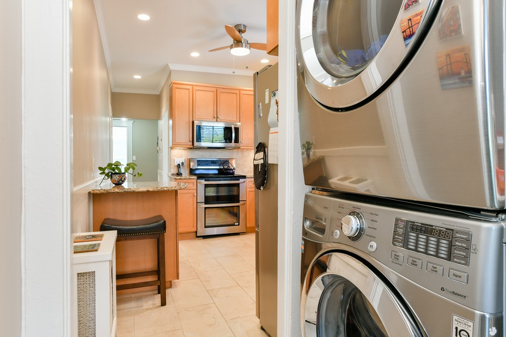 149 Winthrop Road, Unit 3 Brookline, MA 02445 - Photo 16 of 18 a view of a hallway with washer and dryer
