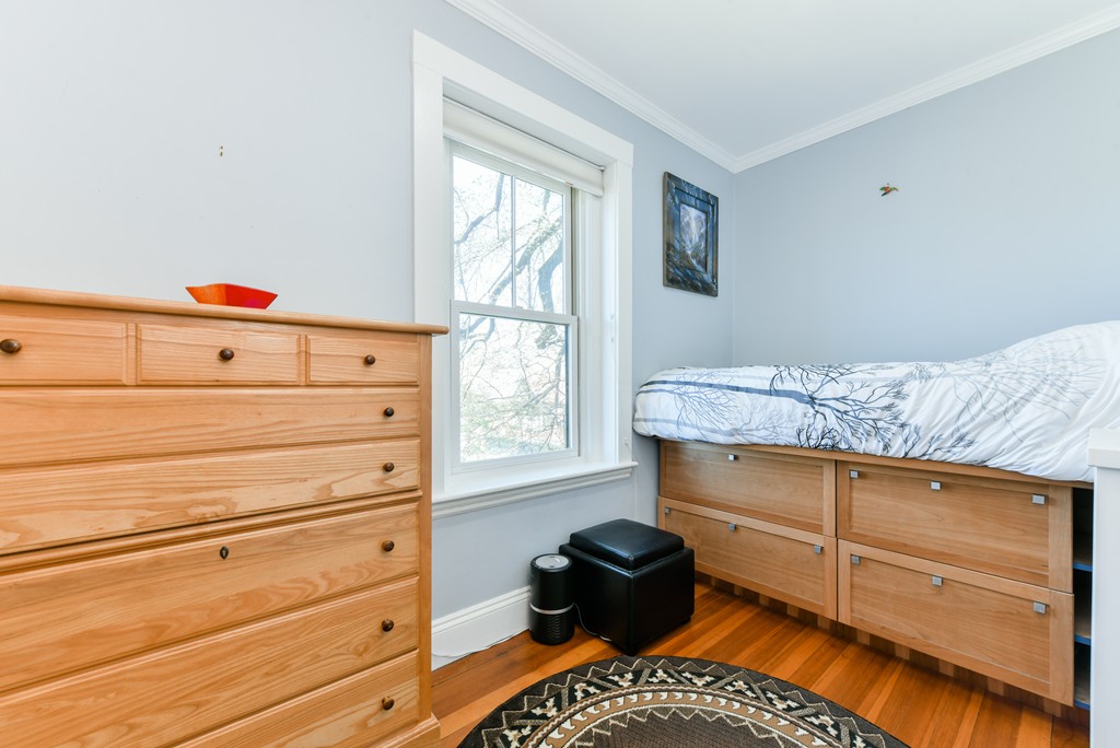 149 Winthrop Road, Unit 3 Brookline, MA 02445 - Photo 17 of 18 a room with a dresser and a window